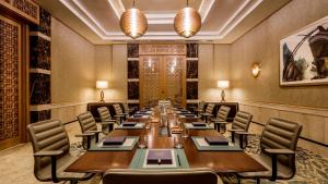 a conference room with a long table and chairs at Four Seasons Hotel Tunis in Gammarth