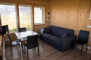 Posezení v ubytování Myllulækur + 33 fotografií