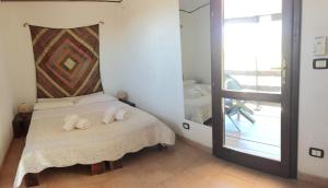 Villaggio La Roccia camping客房内的一张或多张床位