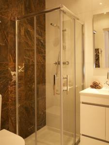 Ванная комната в Cacilhas Guest Apartments
