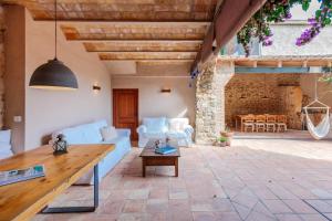 Patio alebo iná vonkajšia časť ubytovania Flateli Tor