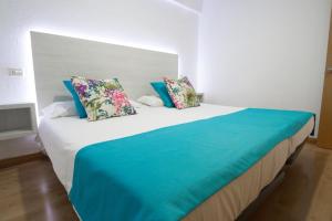 Een bed of bedden in een kamer bij Hotel Green Field