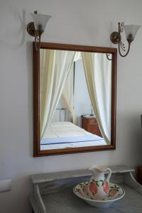 Posteľ alebo postele v izbe v ubytovaní Nostos Guesthouse