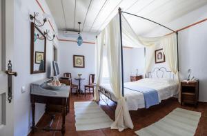 Posteľ alebo postele v izbe v ubytovaní Nostos Guesthouse