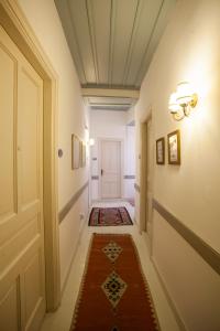 Posteľ alebo postele v izbe v ubytovaní Nostos Guesthouse