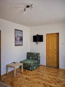 TV a/nebo společenská místnost v ubytování Ráday Apartman