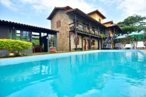 A piscina localizada em Pousada Tanto Mar ou nos arredores