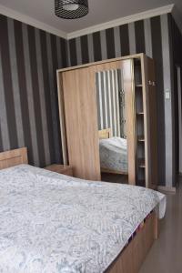 Letto o letti in una camera di Guest house BAGRATIONI