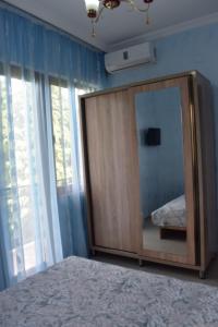 Letto o letti in una camera di Guest house BAGRATIONI