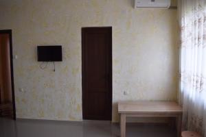 TV o dispositivi per l'intrattenimento presso Guest house BAGRATIONI