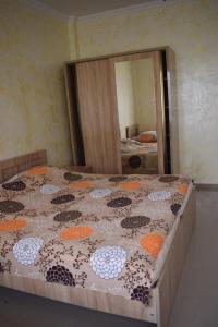 Letto o letti in una camera di Guest house BAGRATIONI