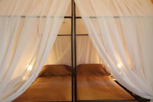 Katil atau katil-katil dalam bilik di Riad Misbah
