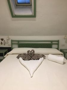 Postel nebo postele na pokoji v ubytování Stella 24
