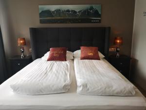 Postel nebo postele na pokoji v ubytování Centrum Hotel