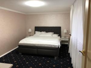 Postel nebo postele na pokoji v ubytování Ioannis