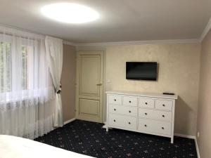 TV a/nebo společenská místnost v ubytování Ioannis