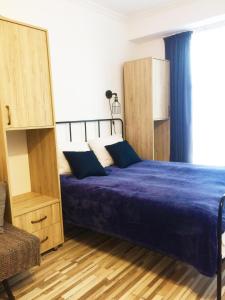 Gudauri loft -Apartment tesisinde bir odada yatak veya yataklar