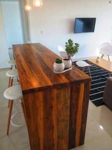 TV a/nebo společenská místnost v ubytování Barrancas Suites