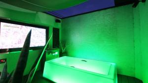 TV a/nebo společenská místnost v ubytování agehA - Adult Only-