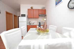 Kuchyň nebo kuchyňský kout v ubytování Apartment Marija