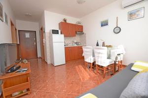 Kuchyň nebo kuchyňský kout v ubytování Apartment Marija