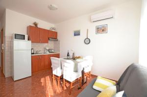 Kuchyň nebo kuchyňský kout v ubytování Apartment Marija