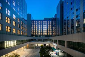 a view of a building at night at Golden Tulip Incheon Airport Hotel in Incheon