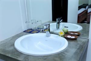 Un baño de Noni Tree Hostel