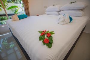 Postel nebo postele na pokoji v ubytování Lagoon Villa Maldives