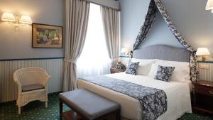 Letto o letti in una camera di Hotel Victoria & Iside Spa