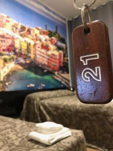 TV a/nebo společenská místnost v ubytování Albergo Corvetto Corso Lodi