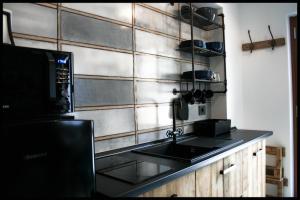 Kuchyňa alebo kuchynka v ubytovaní Casa Vacanze Borc dai Cucs
