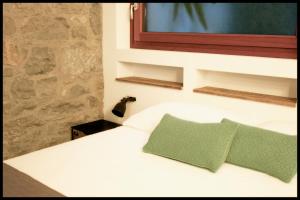 Katil atau katil-katil dalam bilik di Casa Vacanze Borc dai Cucs
