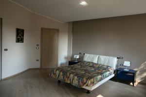 Postel nebo postele na pokoji v ubytování Un sogno che si avvera