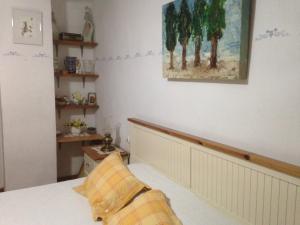 A bed or beds in a room at Casa Las Violetas
