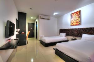 Postel nebo postele na pokoji v ubytování BS Residence Suvarnabhumi + 24 fotografií