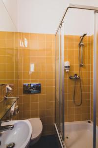 Ett badrum på Hotel Wenus