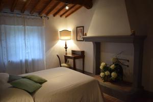 A bed or beds in a room at Agriturismo Spazzavento