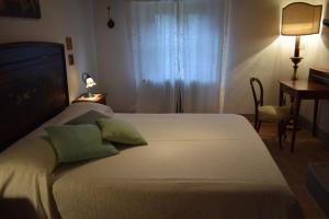 Postel nebo postele na pokoji v ubytování Agriturismo Spazzavento