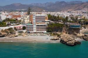 an aerial view of a beach with a resort at Apartamento Yaiza in Nerja