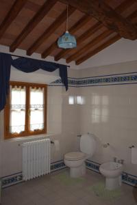 Koupelna v ubytování Agriturismo Spazzavento