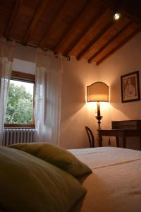 Postel nebo postele na pokoji v ubytování Agriturismo Spazzavento