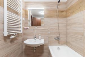 Kúpeľňa v ubytovaní Corvin Residence Apartments
