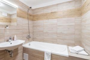 Kúpeľňa v ubytovaní Corvin Residence Apartments