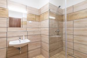 Kúpeľňa v ubytovaní Corvin Residence Apartments