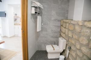 Un baño de Apartamentos Turísticos La Casa Vieja