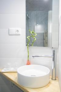 Un baño de Apartamentos Turísticos La Casa Vieja