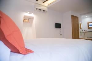 Cama o camas de una habitación en Apartamentos Turísticos La Casa Vieja