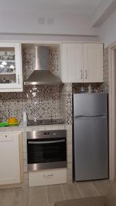 Kuchyň nebo kuchyňský kout v ubytování Villasabella 2 Apartments