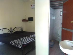 Koupelna v ubytování Stay Goa Guesthouse